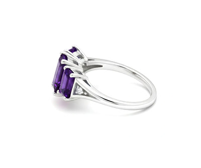Amethyst center stone ring with sparkling white zircon accents set in elegant sterling silver