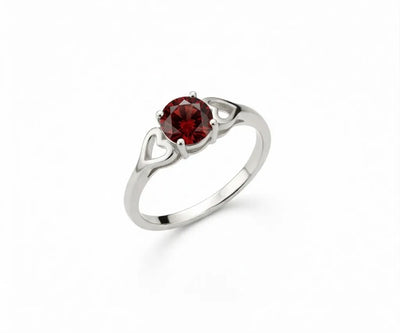 Deep red garnet ring that exudes classic elegance with a rich, captivating gemstone centerpiece