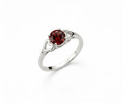 Deep red garnet ring that exudes classic elegance with a rich, captivating gemstone centerpiece