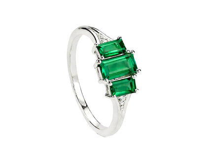 Emerald with white zircon sterling silver ring featuring a vibrant green center stone with sparkling zircon accents