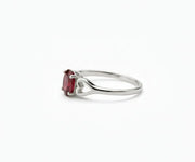 Garnet ring with deep red gemstone that exudes classic elegance and vibrant sophistication