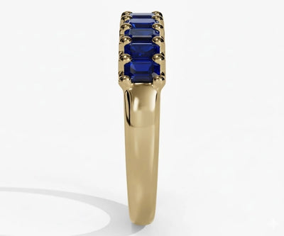 Elegant blue sapphire ring with baguette cut stone set in minimalist silver band for women’s fine jewelry