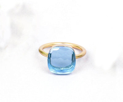 Statement silver ring with a vibrant blue topaz hydro gemstone, perfect for confident, elegant style