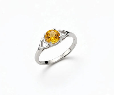 Citrine ring featuring a radiant golden-yellow gemstone that exudes warmth and elegant sophistication.