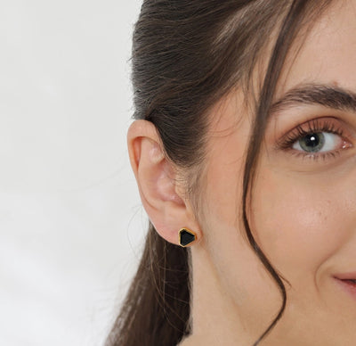 Sleek black onyx stud earrings crafted with a bold, polished finish for a modern look. dainty gemstone earrings