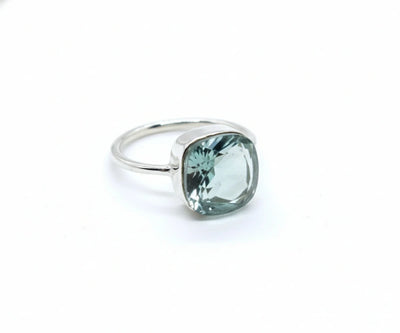 Statement aquamarine stackable ring featuring a bold aquamarine gemstone with a modern design, perfect for layering or wearing solo.