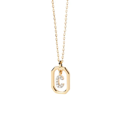 A C initial necklace gold featuring a polished letter “C” pendant on a delicate gold chain, creating a personalized and elegant jewelry piece.