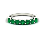 Modern sterling silver band ring with rich green emerald hydro gem, blending sophistication and natural charm
