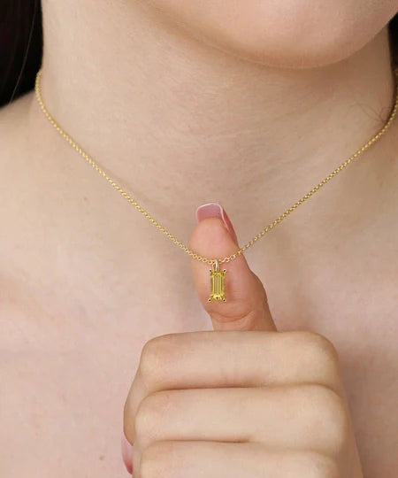Elegant gold and gemstone jewelry designed to celebrate timeless love and cherished anniversaries