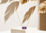 Charoite Necklace with custom-cut purple gemstone
