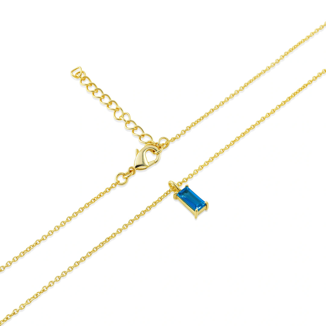 March birthstone necklace with a shimmering aquamarine baguette gemstone, capturing ocean-inspired serenity in a modern, timeless design.