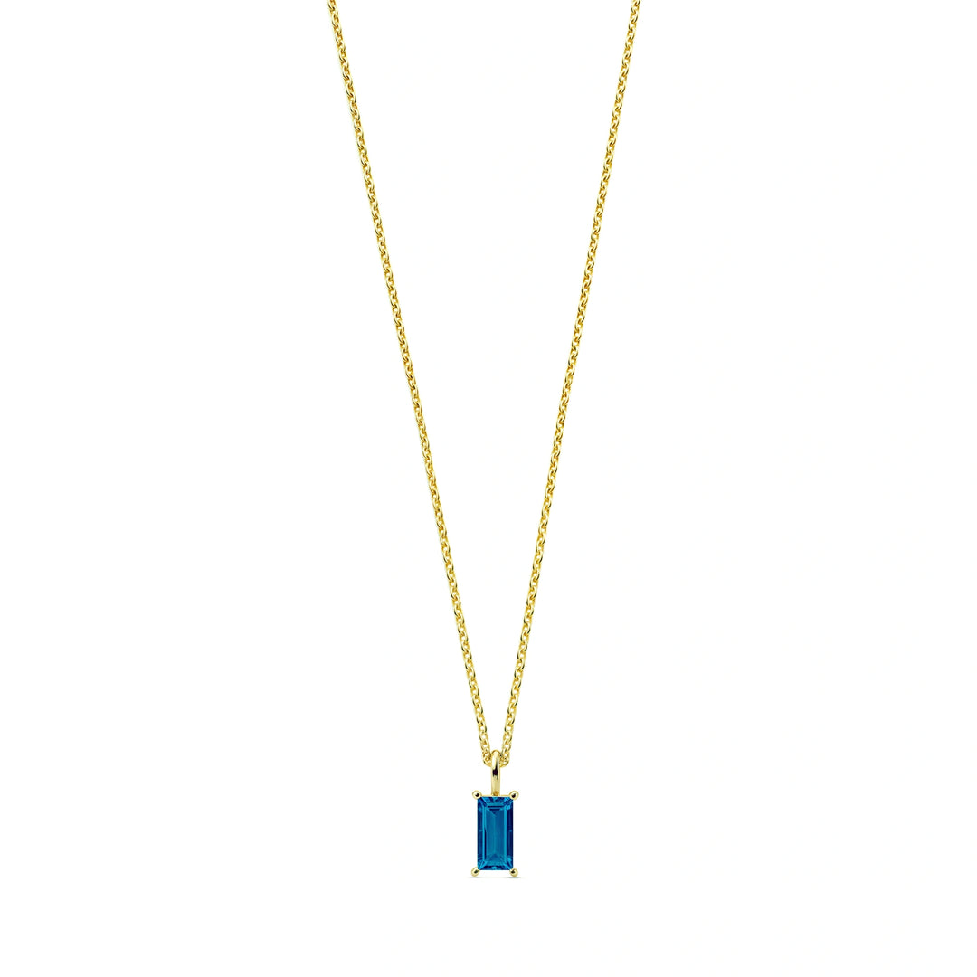 Aquamarine birthstone necklace with a tranquil blue baguette-cut gem set in 14K gold plating, symbolizing calm, clarity, and March birthdays.