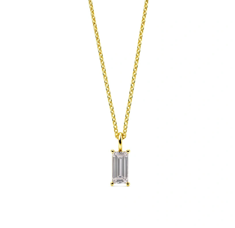 This April birthstone necklace features a sparkling clear gemstone, symbolizing strength and clarity.


