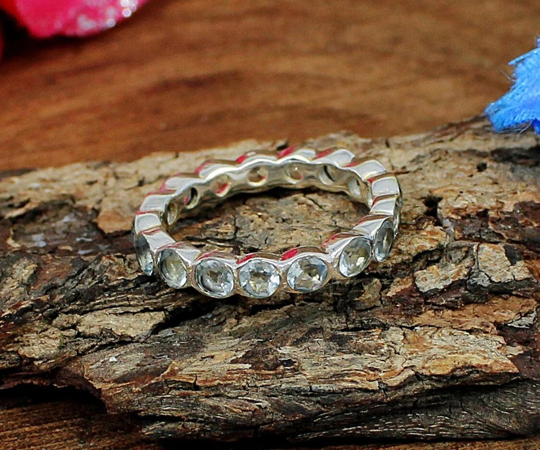 Delicate 925 silver band ring with a calming 3mm aquamarine hydro stone, perfect for stacking or solo wear
