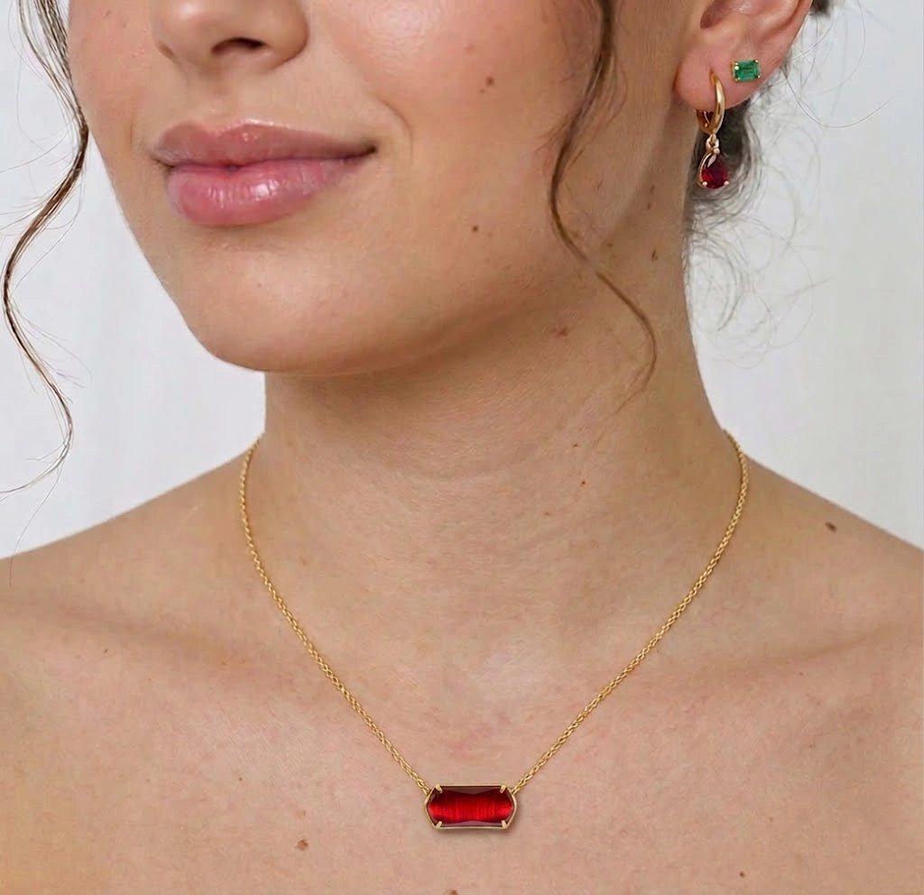 Elegant ruby birthstone necklace with red gemstone pendant and adjustable gold chain