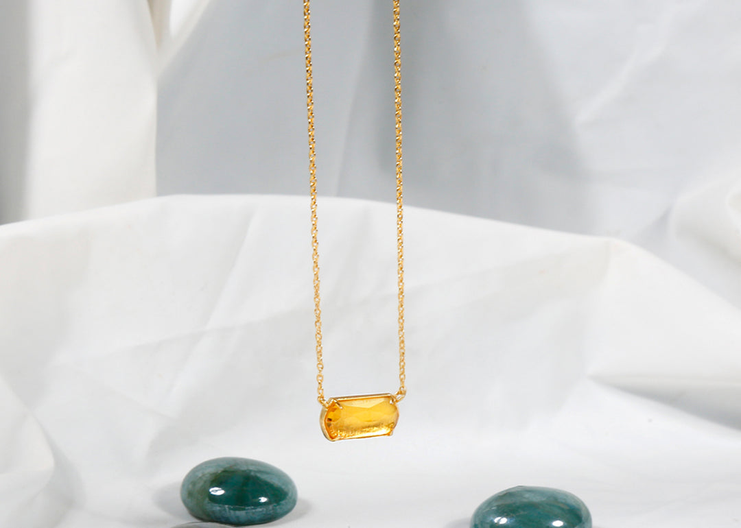 Model wearing citrine necklace with everyday outfit