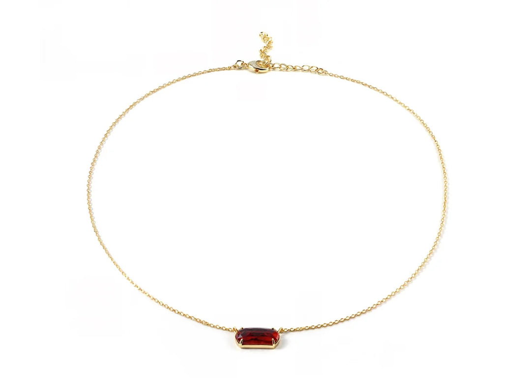 Detailed view of secure spring clasp and ruby pendant