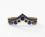 Blue sapphire ring with round cut stone in sleek silver band for women’s wedding or engagement
