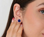 Blue sapphire stud earrings in elegant gold setting featuring deep royal blue gemstones perfect for everyday wear or special occasions
