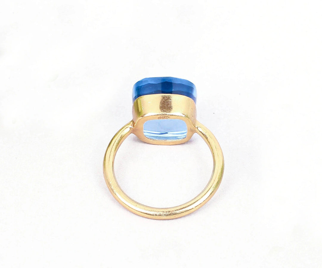 Contemporary blue topaz ring with radiant color and classic silver craftsmanship