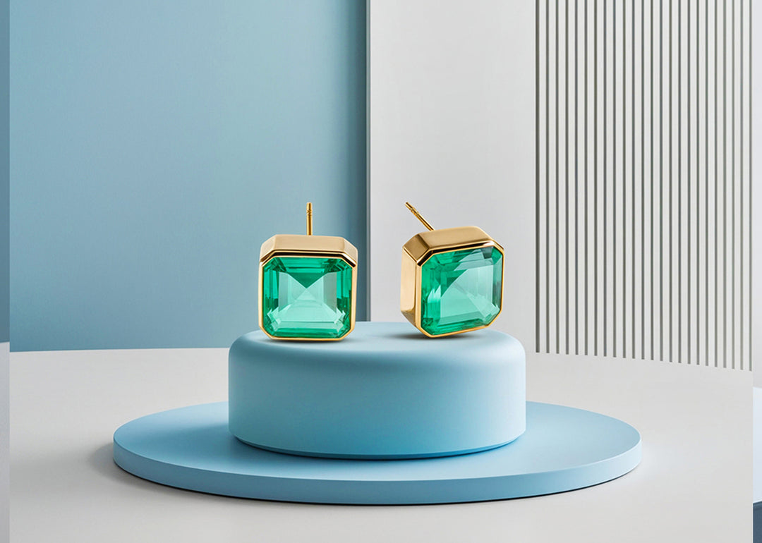 Modern square design studs with 10mm Emerald Quartz and secure push-back closure.