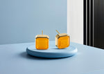 Load image into Gallery viewer, Modern square design studs with 10mm Sunlit Quartz and secure push-back closure.
