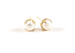 Load image into Gallery viewer, Oversized 10mm freshwater pearl studs on display
