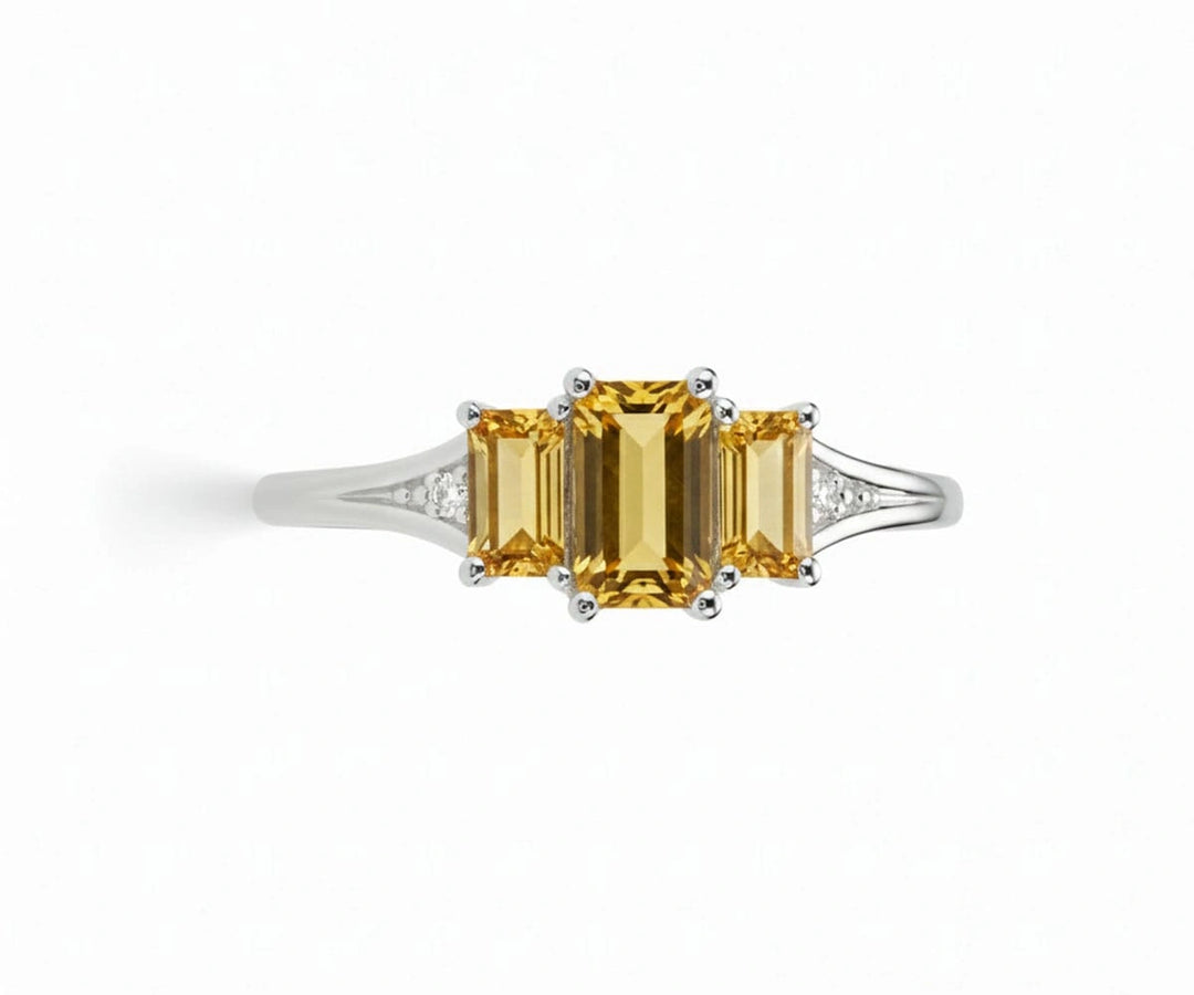 Elegant citrine and white zircon ring set in sterling silver with a warm golden center stone and brilliant zircon sparkle