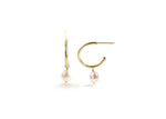 Load image into Gallery viewer, Close-up of modern pearl hoops with push back closure
