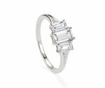 Crystal and white zircon sterling silver ring with a radiant clear gemstone center and delicate sparkling accents
