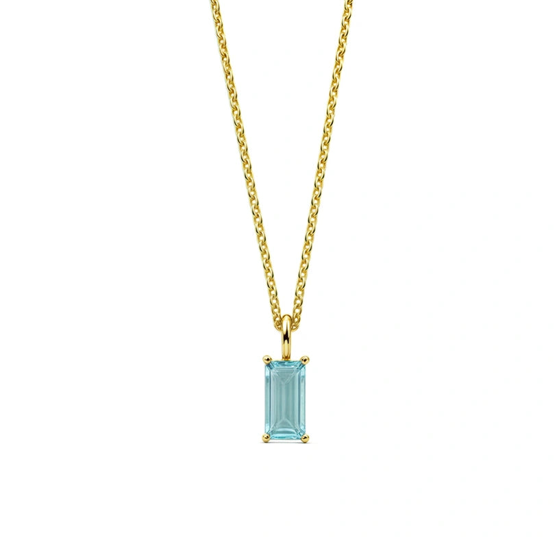 This blue topaz birthstone necklace showcases a serene sky-blue gemstone in an elegant pendant necklace for women.

