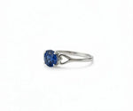 Sapphire and white diamond ring that combines classic elegance with a touch of vibrant blue brilliance
