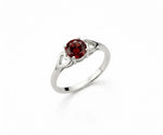 Deep red garnet ring that exudes classic elegance with a rich, captivating gemstone centerpiece
