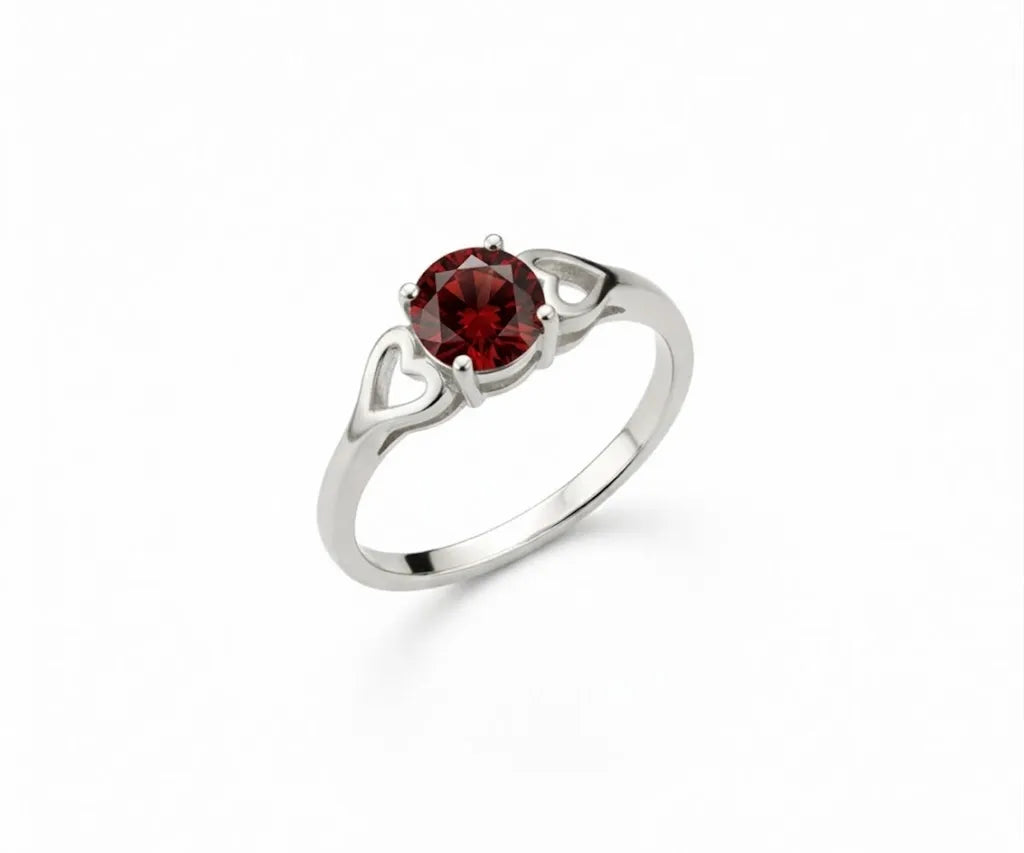 Deep red garnet ring that exudes classic elegance with a rich, captivating gemstone centerpiece