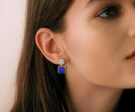 Load image into Gallery viewer, Blue sapphire and zirconia drop earrings with gold-plated finish
