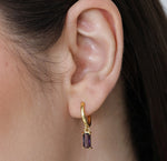 Dainty amethyst gemstone hoops with secure clasp, lightweight and stylish for everyday wear.

