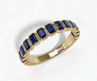 Emerald cut lab blue sapphire ring in sterling silver with deep blue gemstone and sleek minimalist band