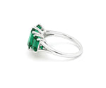 Sterling silver emerald ring with white zircon stones creating a classic and radiant gemstone statement ring
