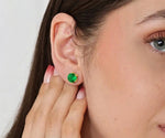 Emerald stud earrings in gold setting featuring vibrant green gemstone, elegant minimalist jewelry for everyday wear and special occasions
