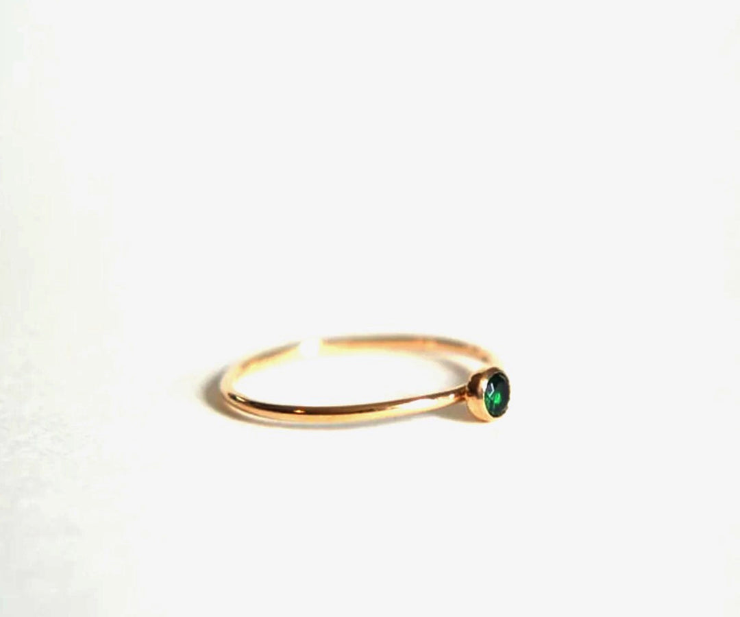 Eye catching silver plated emerald ring with vibrant green centerpiece for women
