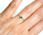 Trendy silver plated emerald ring with rich green gemstone and sleek finish
