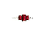 Sterling silver garnet ring with white zircon accents combining rich red color with brilliant sparkle for a timeless jewelry style
