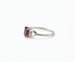 Garnet ring with deep red gemstone that exudes classic elegance and vibrant sophistication
