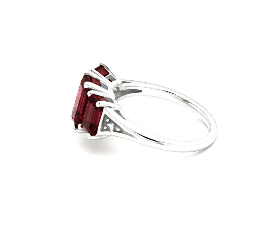 Garnet with white zircon statement ring in sterling silver showcasing a vibrant red center stone with delicate shimmering details