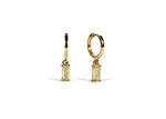 Load image into Gallery viewer, gold huggie earrings with radiant citrine baguette stones.
