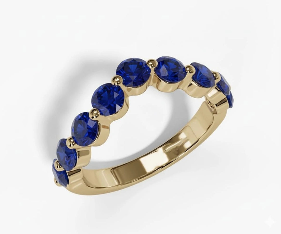 Round cut lab blue sapphire ring with brilliant deep blue gemstone set in elegant sterling silver band