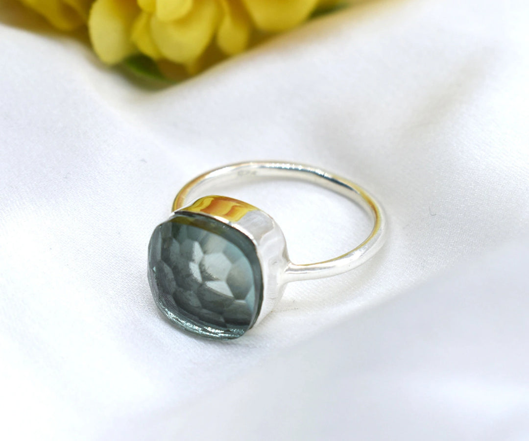 Statement aquamarine stackable ring with calming green hues and a modern square-cut design
