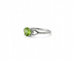 Peridot ring featuring a vibrant green gemstone that radiates fresh elegance and timeless style
