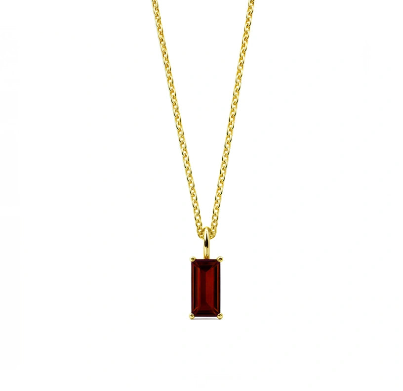 This January birthstone garnet necklace features a rich red gemstone set in a gold-plated pendant.

