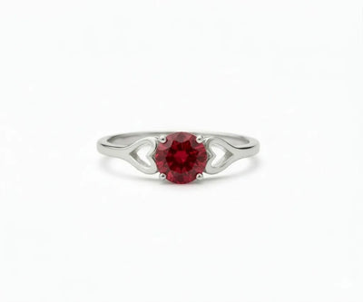 Ruby ring that exudes classic elegance with a vibrant red gemstone centerpiece and refined sparkle